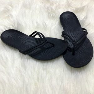 Women’s black Crocs sandals